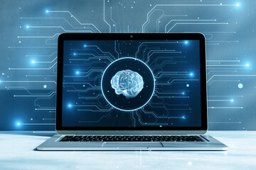 Digital brain on a laptop screen depicting the concept of artificial intelligence and machine...
