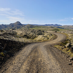 A view of the dirt road among the lava fields. Helgafellssveit, Iceland.