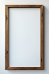 An empty wooden frame on a white wall  AI generated illustration