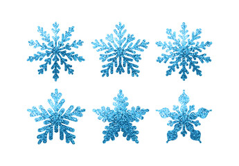 Set of snowflakes in glitter of blue color. Collection of decorative elements for the Christmas holiday. Vector illustration