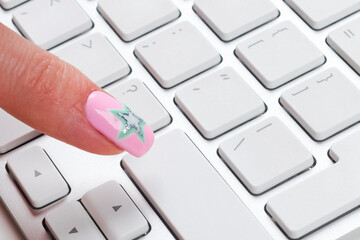 Close up view of a Finger Pushing on a empty Button of computer Keyboard. Finger Pressing a Slim...