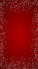 Fototapeta premium Snowfall overlay christmas background. Subtle flying snow flakes and stars on christmas red background. Festive snowfall overlay. Vertical vector illustration.