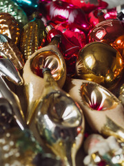 Vertical close up of vintage blown glass Christmas ornaments.