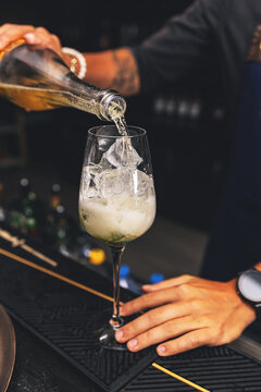 Barman is preparing a cocktail