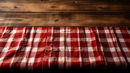 A checkered tablecloth on a wooden background