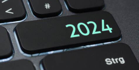 A keyboard with a illuminated button - 2024