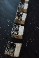 black and white sugar on a wooden table