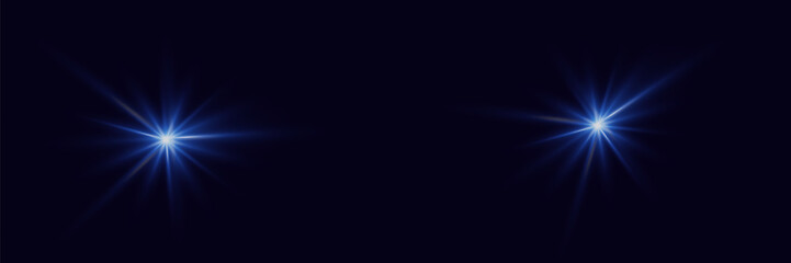 A flash of light and the sparkle of stars. Light of lights and glare. On a dark background.