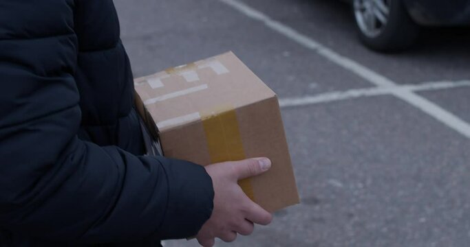 Person carry a box
