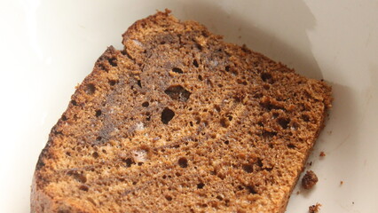 close up of bread texture on a white plate
