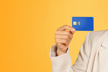 Hand of young korean lady in suit show credit card, enjoy shopping