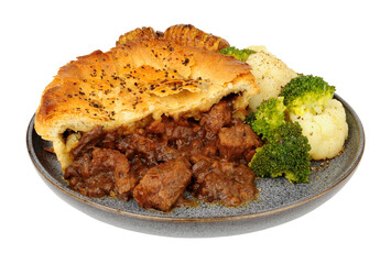 Steak pie with rich all butter puff pastry meal with hasselback potatoes, broccoli and cauliflower...