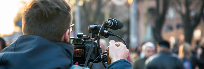 man video operator shoots video