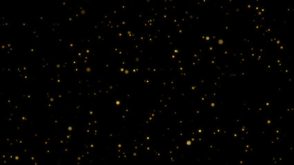 Particle gold dust flickering on black background