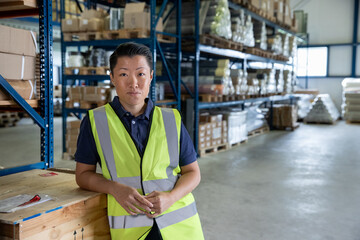 Portrait of employee in distribution warehouse