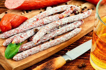 Kabanos, long thin sausages and glass of beer.