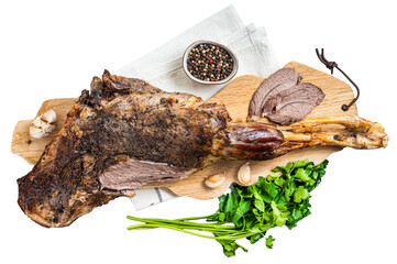 Whole roast mutton lamb leg with spices on a wooden board.  Transparent background. Isolated.