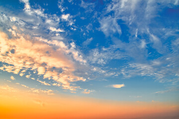 Background with sky and clouds at sunset. Romantic background on the theme of ecology and atmosphere.