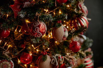 Red christmas tree decorations close-up on dark background