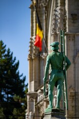 Fototapeta na wymiar Statue in the Square du Petit Sablon in Brussels, Belgium