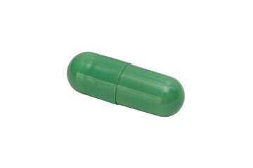 A pill of green color isolated on a white background. Macro. PNG