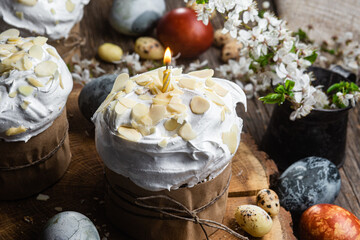 panettone. Easter cake with meringue and decoration on the table