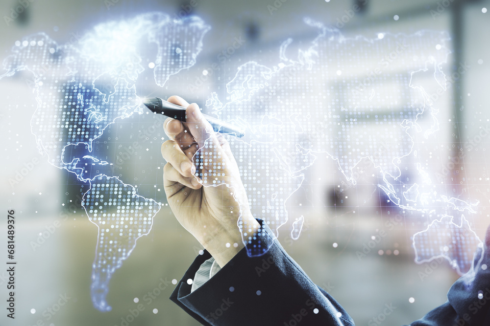 Poster multi exposure of businessman hand with pen working with abstract graphic world map on blurred offic