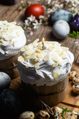 panettone. Easter cake with meringue and decoration on the table