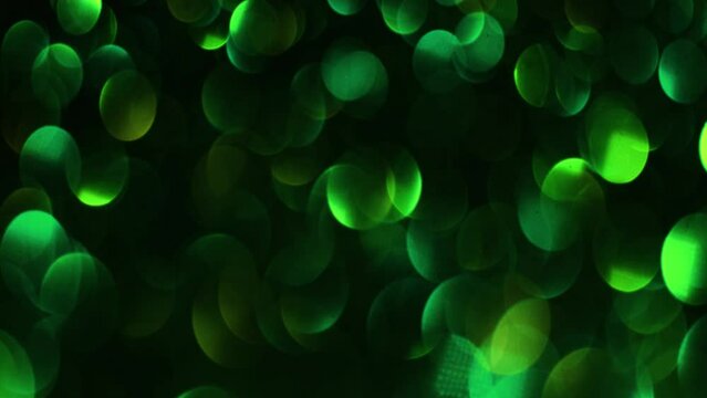 Small Blur Neon Lights transition. Bokeh Blur Circles Shimmering On Dark. Amazing Lens Flares Light Leaks and Bokeh Motion Effect. 4k animated background or overlay. Multicolored Blur Lights Glowing.