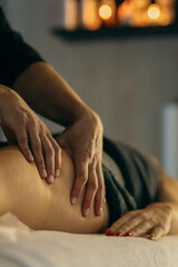 Female hands doing anti-cellulite massage