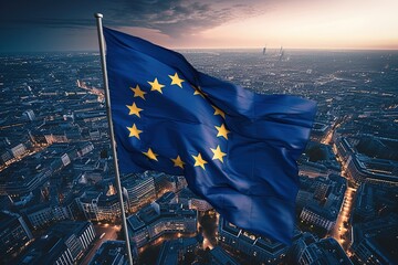 The developing flag of the European Union in the background of a European city and buildings