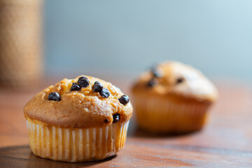 mini cupcakes on a wooden plate