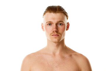 Close up portrait of young handsome redhead man with mustache against white studio background. Concept of beauty, youth.