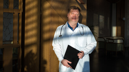 Head doctor hospital in the new renovated hospital, full-length portrait.