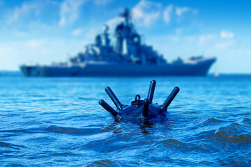 Sea mine floats in water. Warship near underwater bomb. Cruiser for laying sea mines. Bomb for...