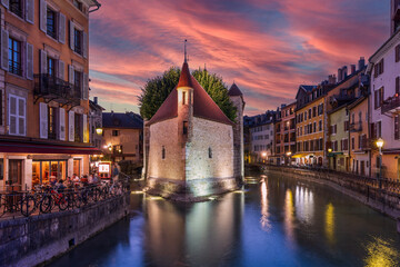 Palais de l'isle, on the Thiou river, in the evening, in Annecy, Haute-Savoie, France