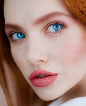 Beauty makeup, beautiful redhead model face closeup photography