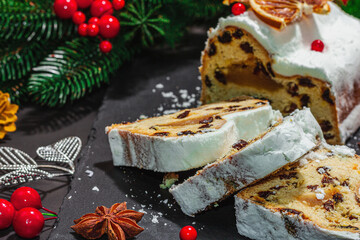 Traditional Christmas stollen, German cake. European pastry, fragrant home baked bread with spices