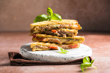Delicious sandwiches with tuna, tomato and cheese. Homemade Tomato BLT Sandwich with tuna