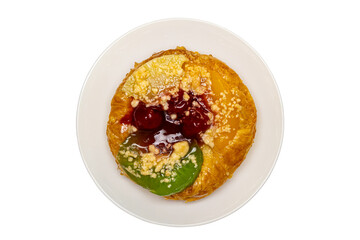 Top view of delicious homemade mixed fruit danish in white ceramic dish isolated on white background with clipping path.