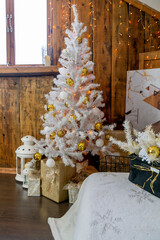 Christmas interior of the living room. The attic room of the house.