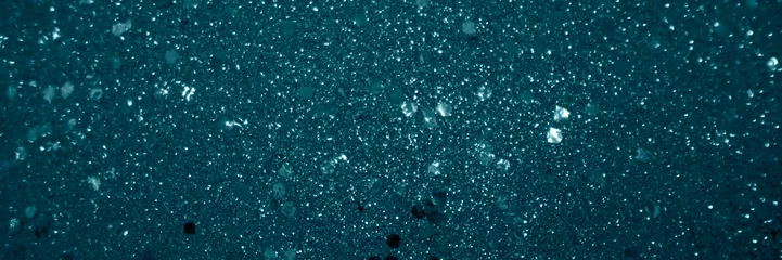 Foto auf Acrylglas textured canvas of teal, with countless specks of white that resemble a blizzard or a flurry of stars in a teal night sky. © vasanty