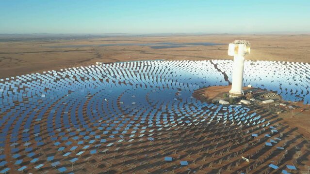Aerial view: Massive array of mirrors around Khi Solar One concentrated solar tower