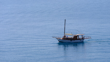 a beautiful tourist boat in the blue sea