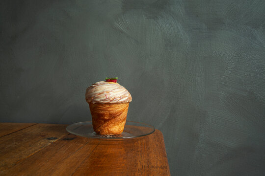 Sweet pastry with garnish on glass plate