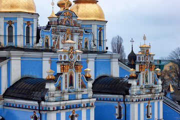 View of the St. Michael Golden-Domed Monastery. Kyiv, Ukraine. Built in the Middle Ages. The exterior was rebuilt in the Ukrainian Baroque in the 18 century while the interior remained Byzantine style - obrazy, fototapety, plakaty