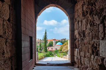 View from ancient crusader castle on the Sultan Abdul Majid Mosque in historical city of Byblos...