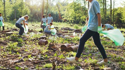 Multicultural people with a voluntary organization conserving environment. Enthusiastic eco...