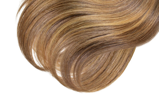 Hair in shape of heart on white