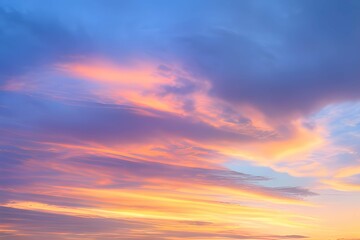 Fototapeta premium 青空とオレンジ色に染まる夕焼け雲